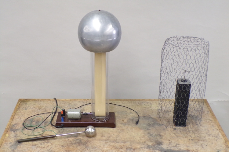 Electrostatic pinwheel in cage